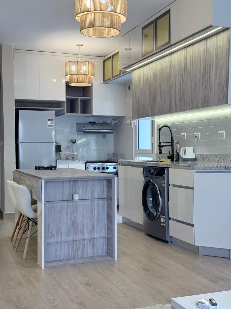 Kitchen or kitchenette, Dining area, oven, stove, washing machine, dryer
