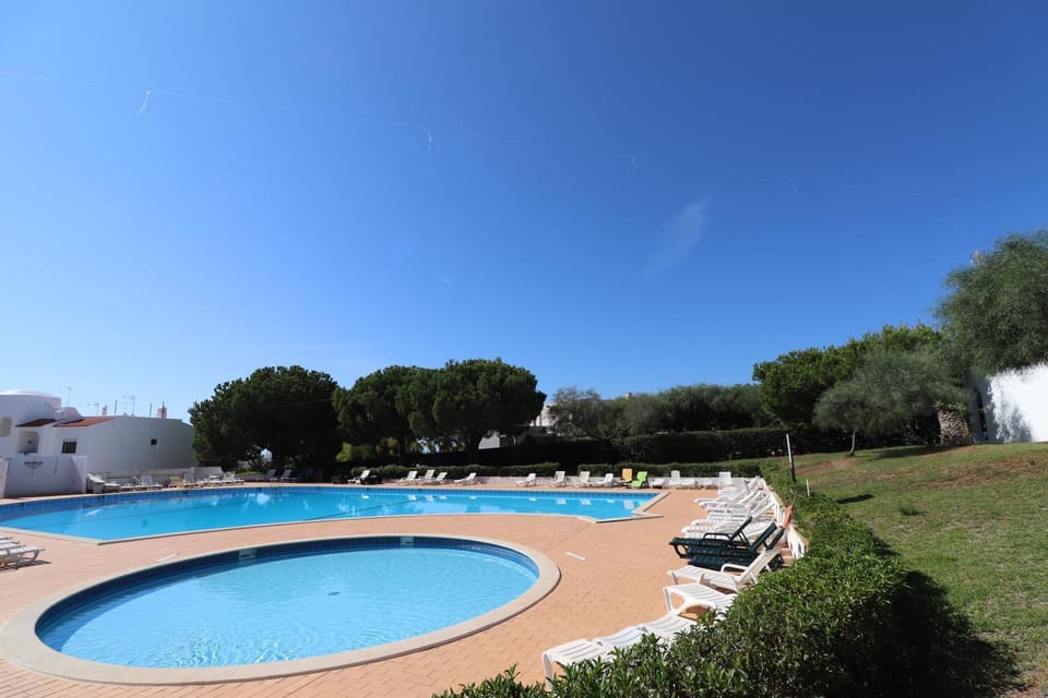 Property building, Living room, Swimming pool