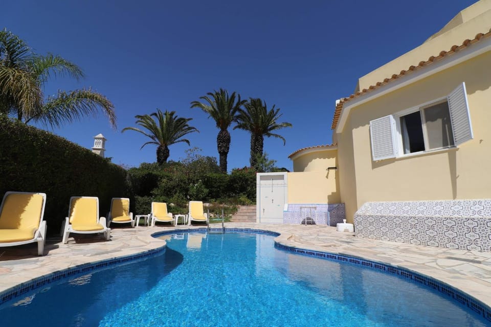 Property building, Living room, Swimming pool