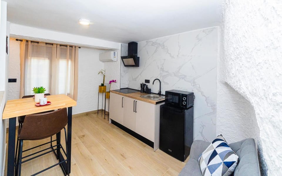 Kitchen or kitchenette, stove