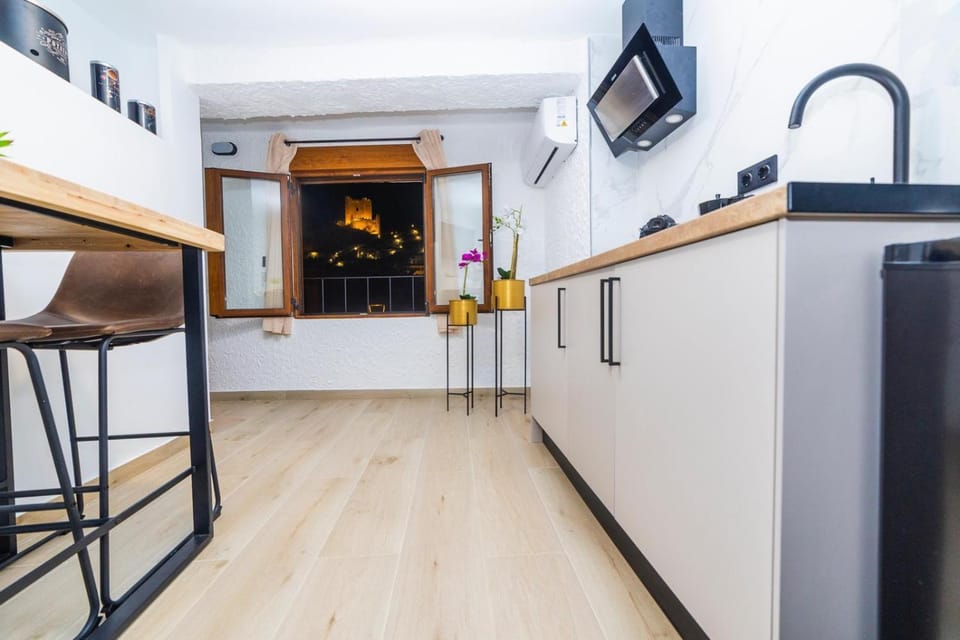 Kitchen or kitchenette, stove