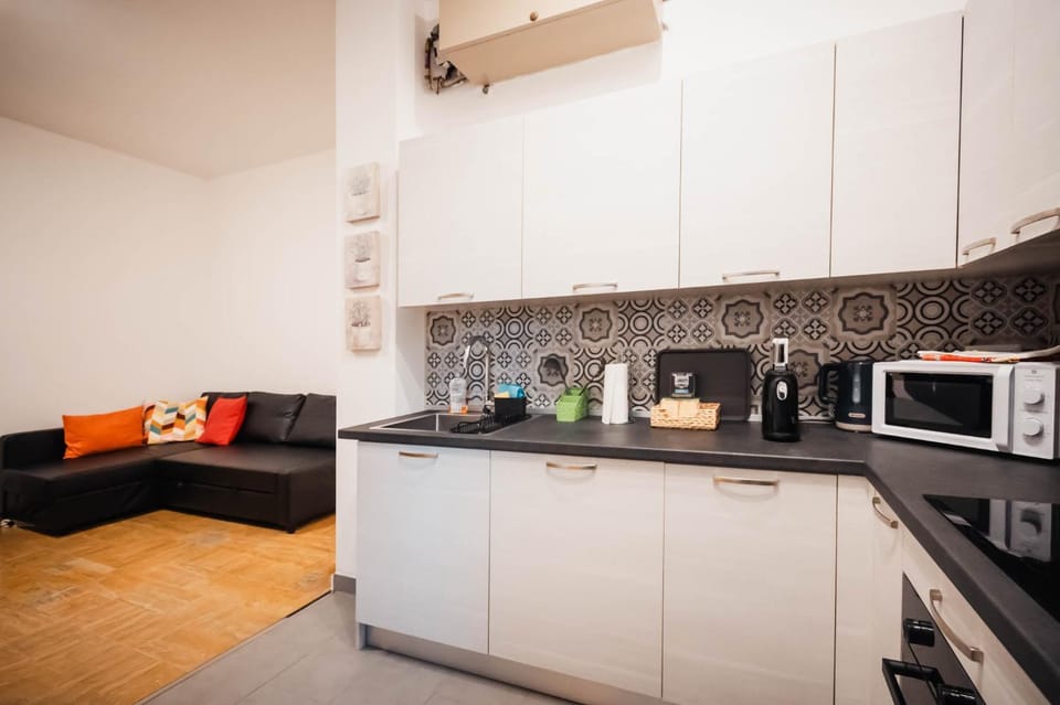 Coffee/tea facilities, Kitchen or kitchenette, Living room, Seating area, dishwasher, oven, pet friendly, stove, toaster