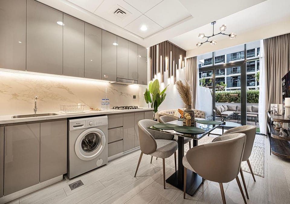 Kitchen or kitchenette, stove, washing machine