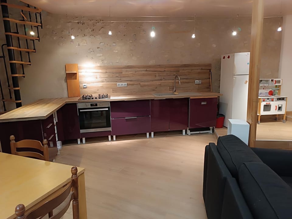 Kitchen or kitchenette, dishwasher, oven, stove