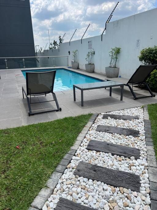 Liams blue suite at 93 On New Apartment in Gauteng
