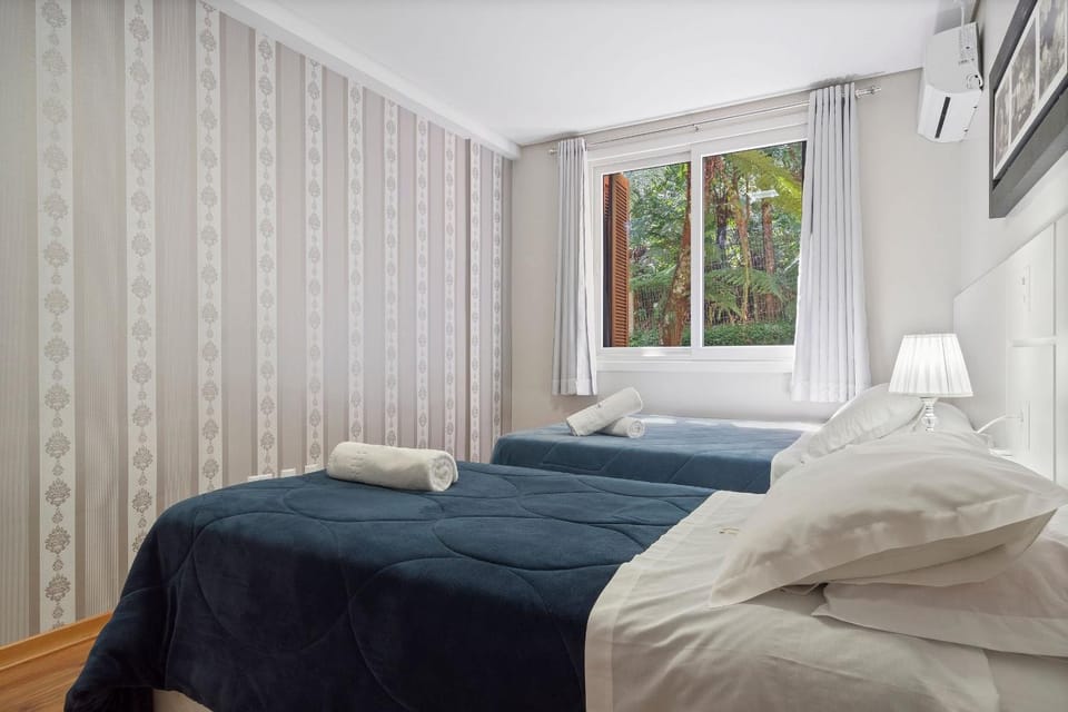 Flores da Montanha Centro by Achei Gramado Apartment in Gramado