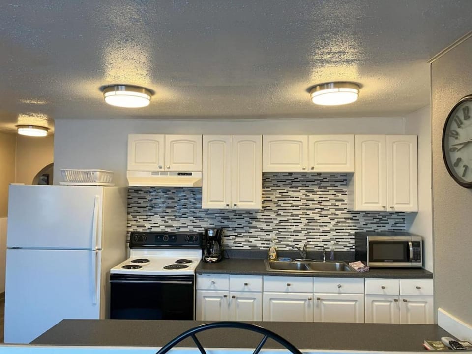 Kitchen or kitchenette, oven, stove, toaster