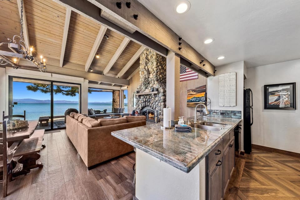 Property building, Day, Natural landscape, View (from property/room), Kitchen or kitchenette, Living room, Seating area, Dining area, Lake view, fireplace, furniture, kitchen