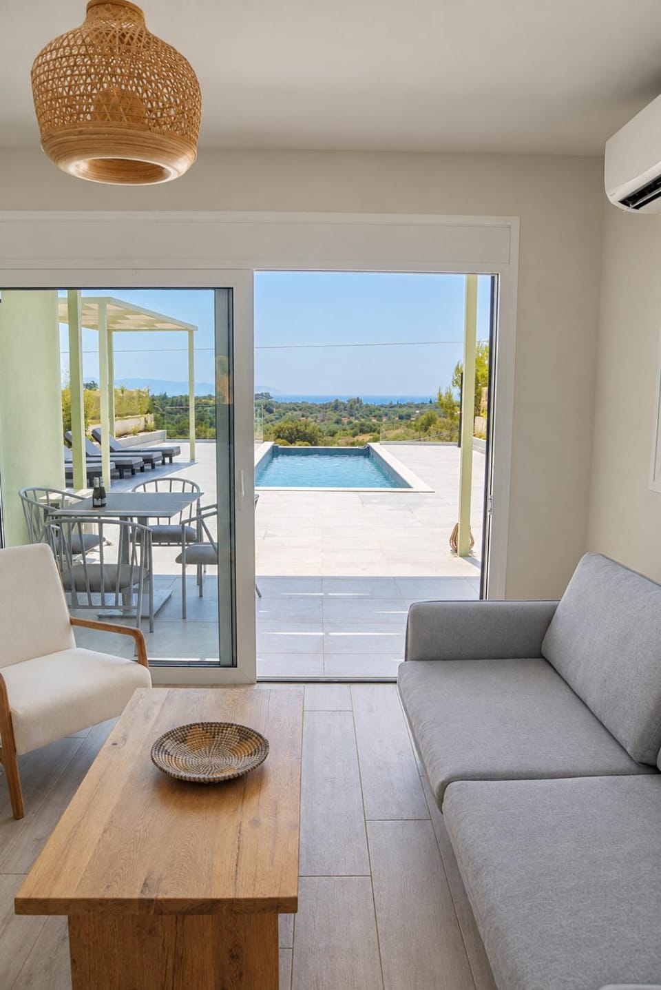 Patio, Day, Natural landscape, View (from property/room), Balcony/Terrace, Living room, Seating area, Dining area, Pool view, Sea view, Swimming pool, sunbed
