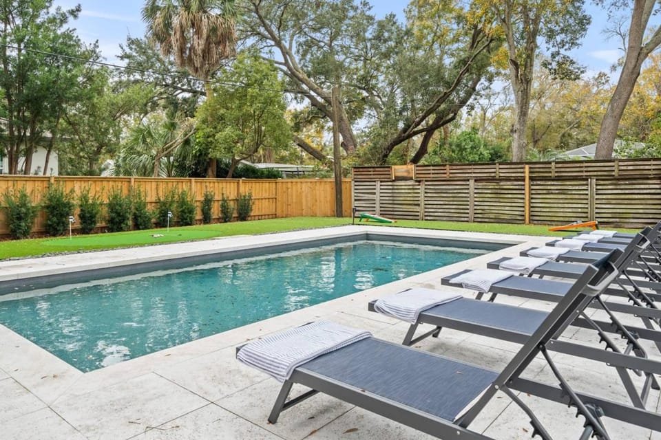 Sunset Greens is a newly renovated 3 bedroom heated pool home in South Tampa with putting green House in Tampa