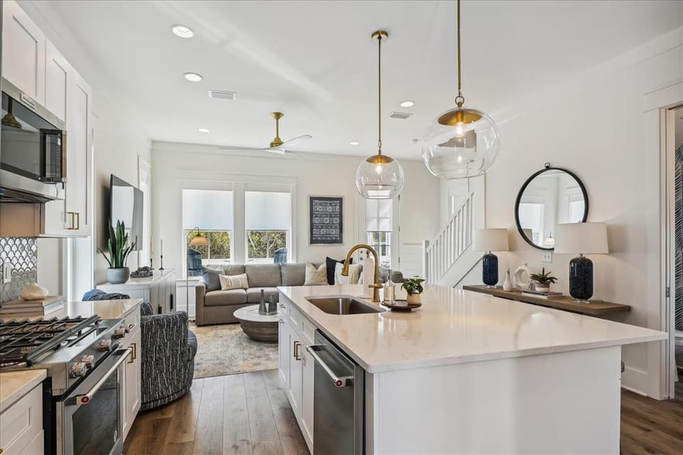Kitchen or kitchenette, dishwasher, oven, stove