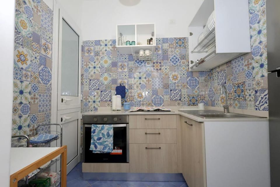 Kitchen or kitchenette, oven, stove