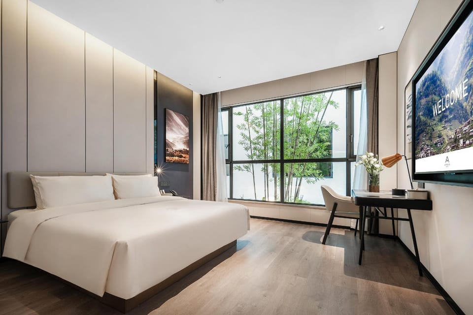 Bed, Living room, Seating area, Bedroom