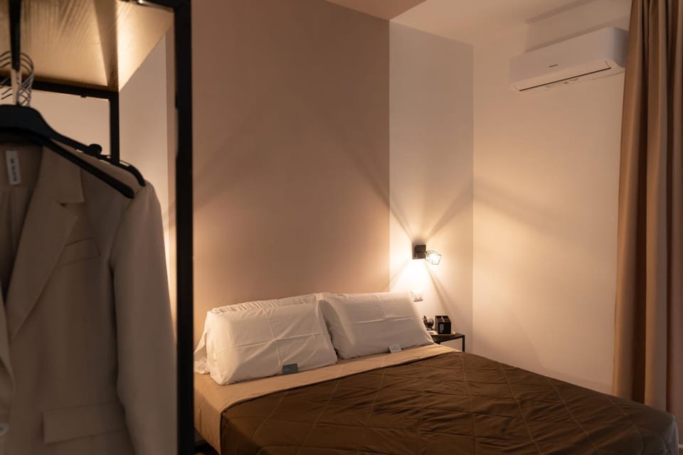 Bed, Photo of the whole room, Bedroom, towels, air conditioner