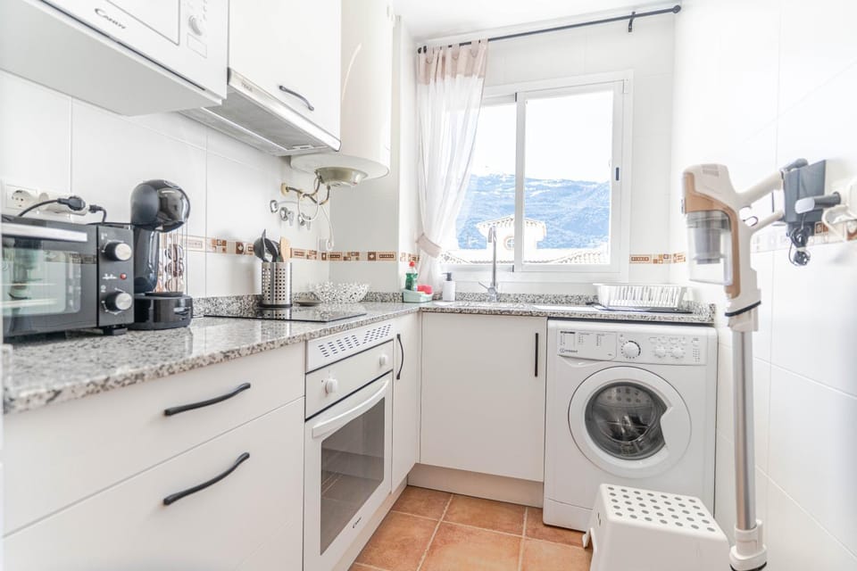 Kitchen or kitchenette, oven, stove, toaster