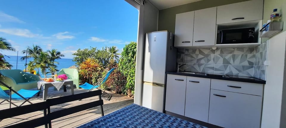 Patio, Natural landscape, Kitchen or kitchenette, Dining area, Garden view, Pool view, Sea view, stove