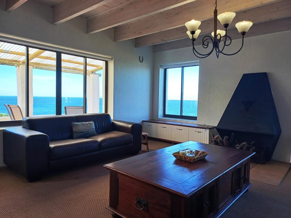 Communal lounge/ TV room, Sea view, fireplace