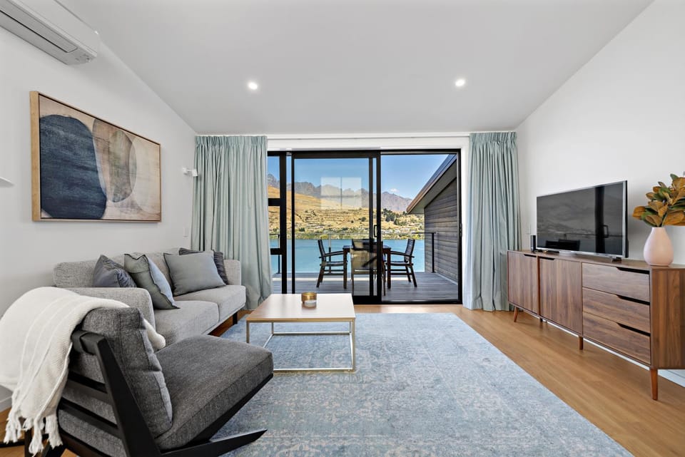 Natural landscape, TV and multimedia, Living room, Seating area, Lake view, Mountain view