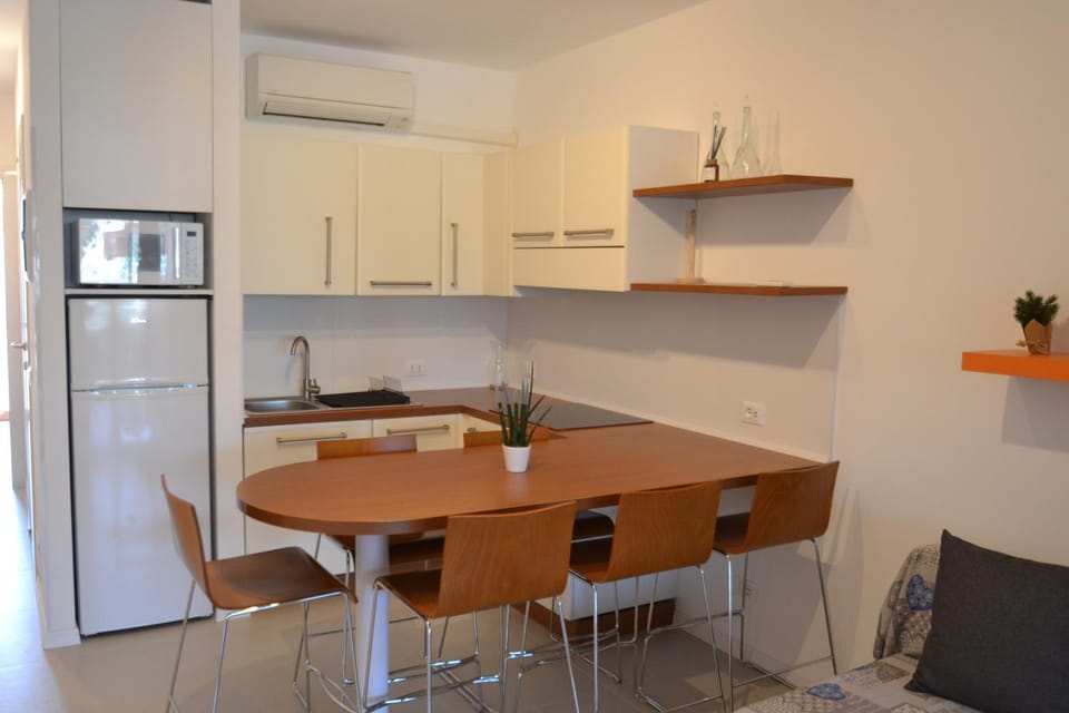 Kitchen or kitchenette, Living room, Dining area, microwave, kitchen, air conditioner