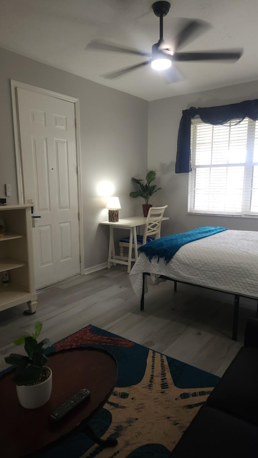 Queen Bed with Sitting Area at IMG Apartment in Longboat Key