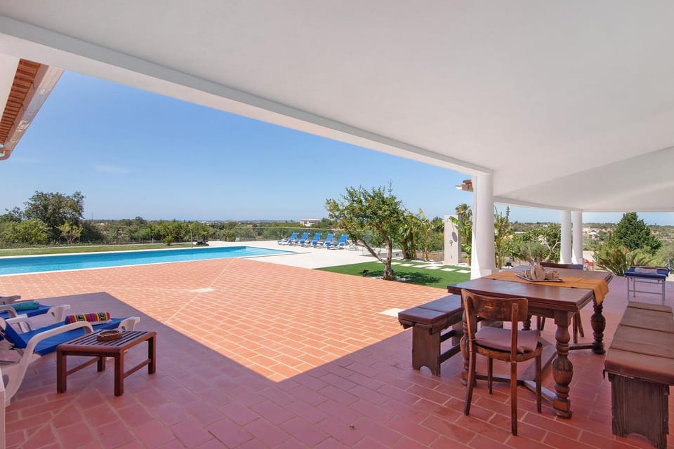 Property building, Living room, Swimming pool