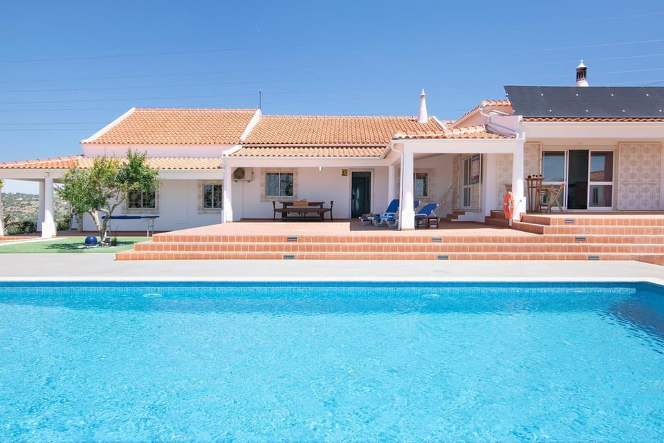 Property building, Living room, Swimming pool