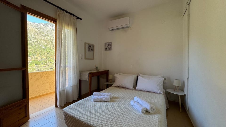 Bed, View (from property/room), Bedroom, Garden view, Mountain view, towels, air conditioner