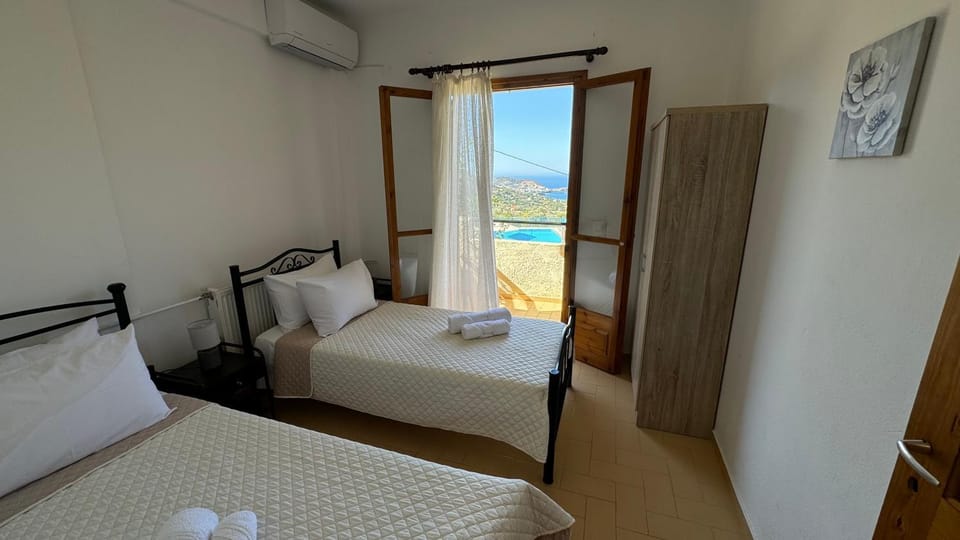 Bed, View (from property/room), Bedroom, Pool view, Sea view, towels, air conditioner