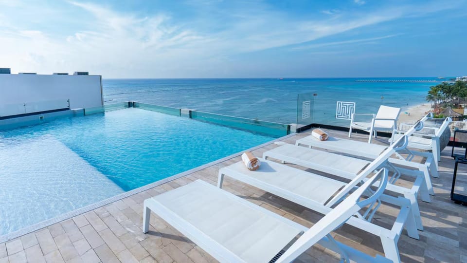 View (from property/room), Pool view, Sea view, sunbed