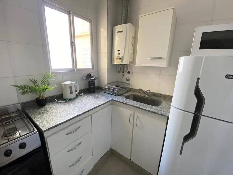 Kitchen or kitchenette, oven, stove