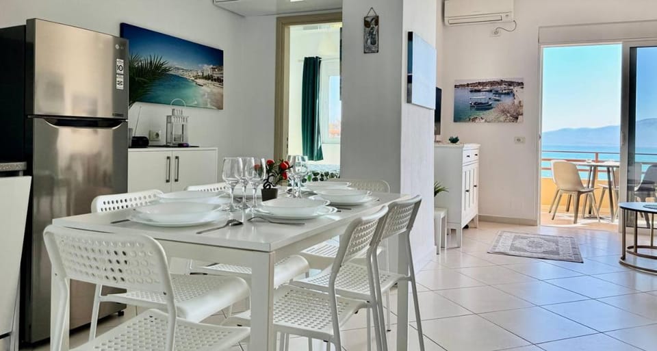Kitchen or kitchenette, Living room, Seating area, Dining area, Sea view