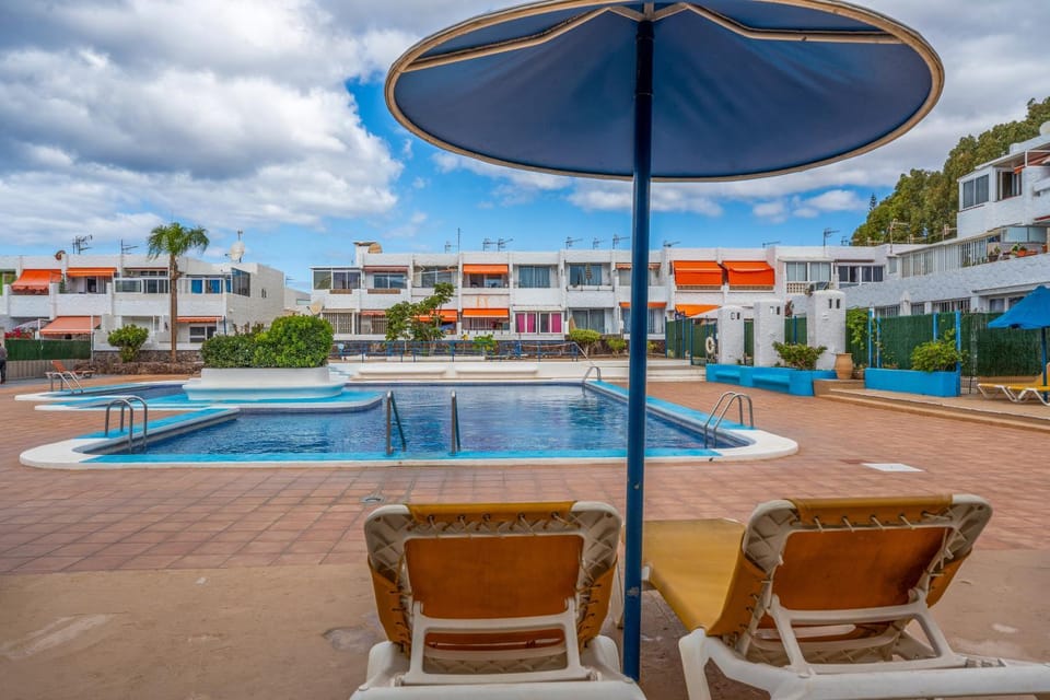 Property building, Living room, Swimming pool