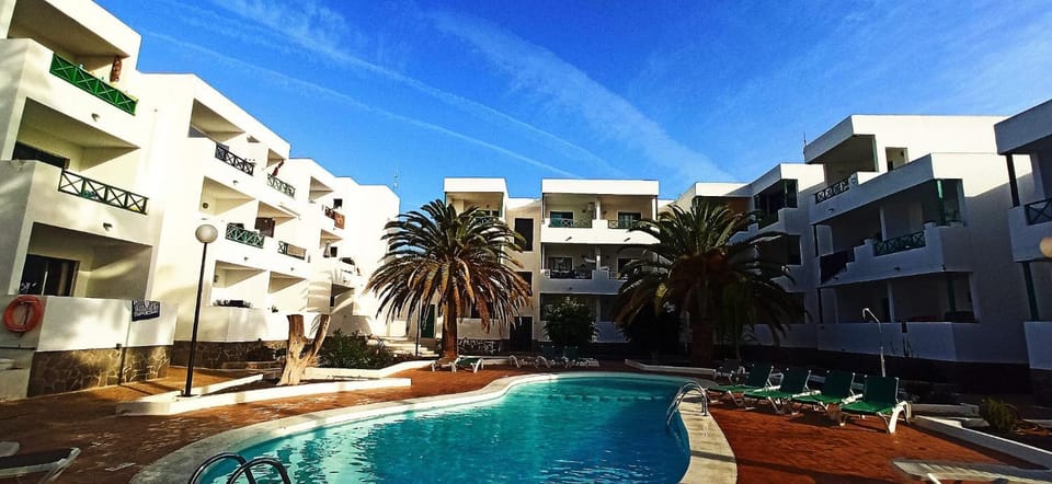 Property building, Pool view, Swimming pool, sunbed