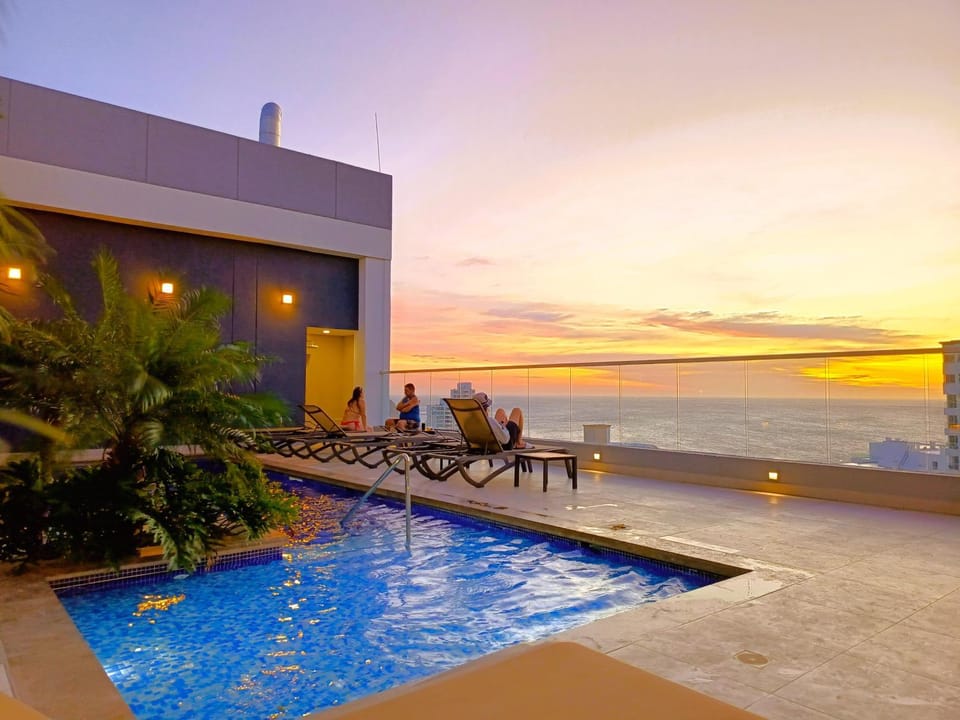 Pool view, Sea view, Swimming pool, Sunset, sunbed