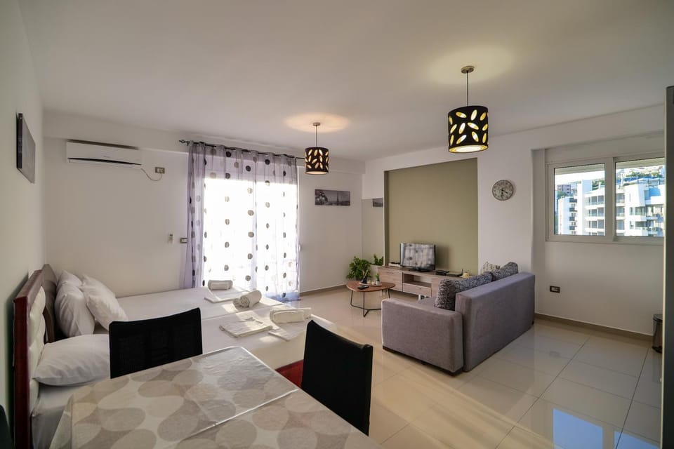 Bed, TV and multimedia, Living room, Photo of the whole room, Seating area, air conditioner