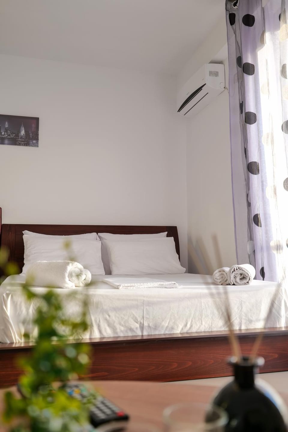 Bed, towels, air conditioner