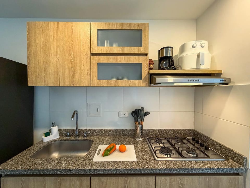Kitchen or kitchenette, stove
