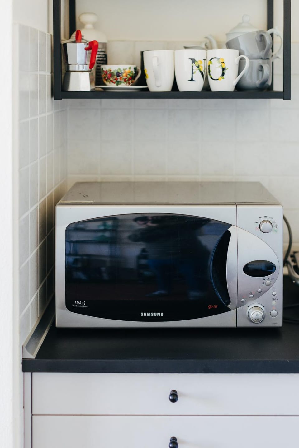 Kitchen or kitchenette, microwave