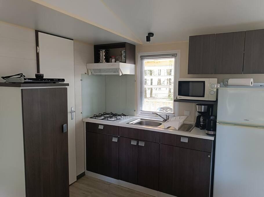 Kitchen or kitchenette, stove, toaster
