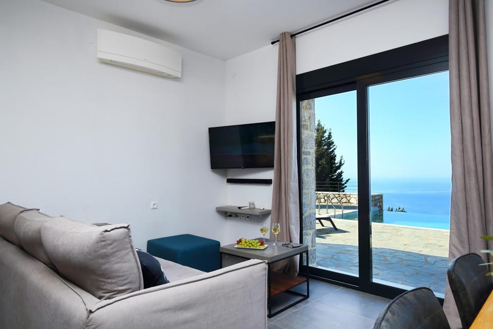 View (from property/room), Living room, Pool view, Sea view