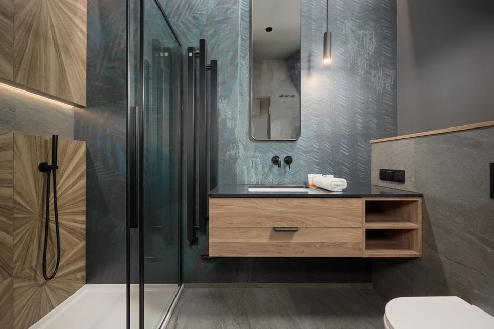 Shower, Toilet, Bathroom, hair dryier, towels