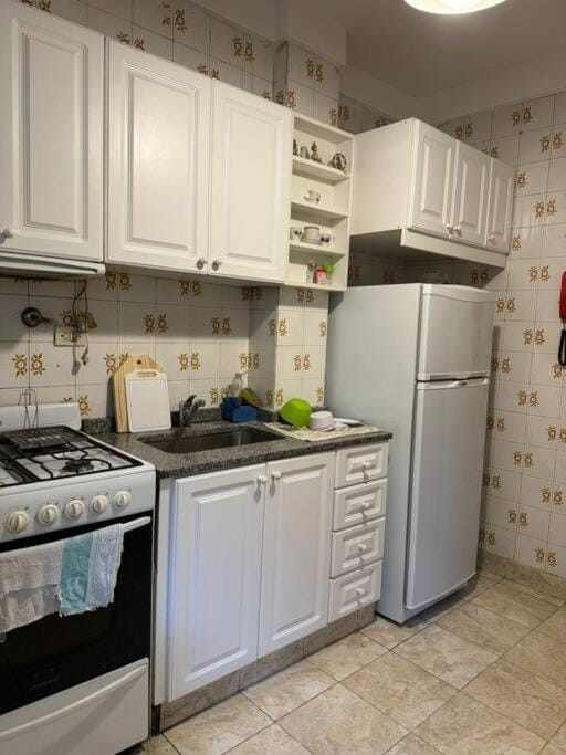 Kitchen or kitchenette, oven, stove, toaster