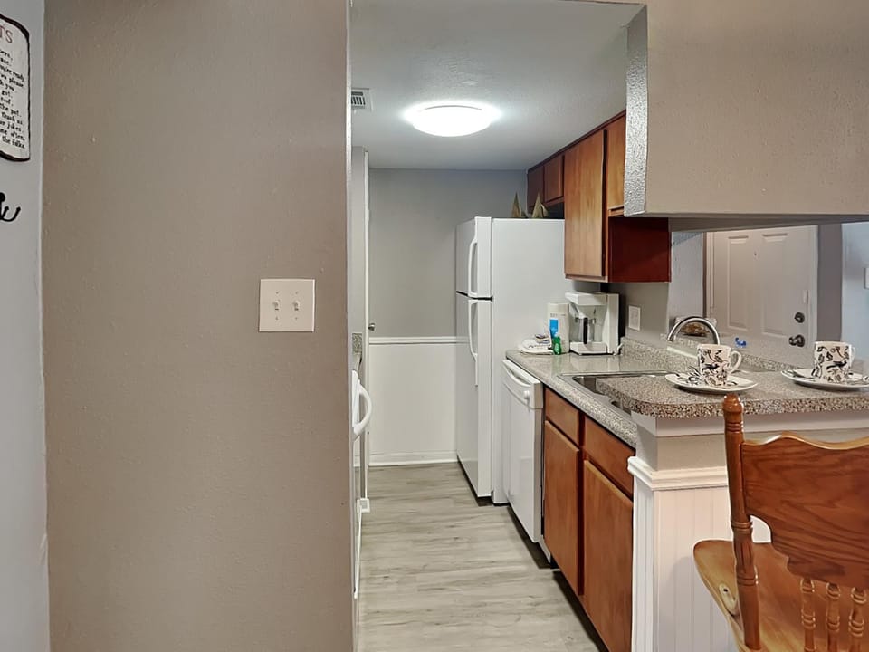 Kitchen or kitchenette, dishwasher, microwave, oven, stove, kitchen
