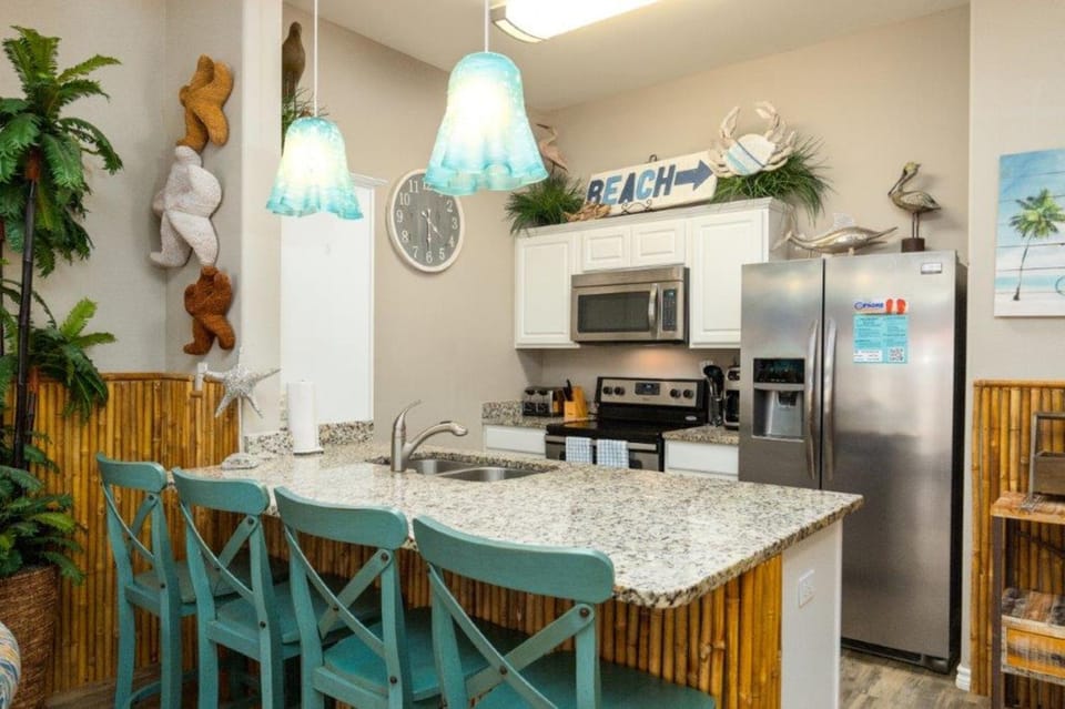 Kitchen or kitchenette, Seating area, furniture, microwave, stove
