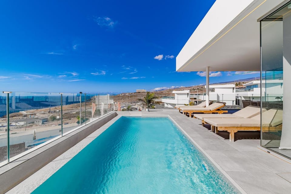 Patio, Natural landscape, Sea view, Swimming pool, sunbed