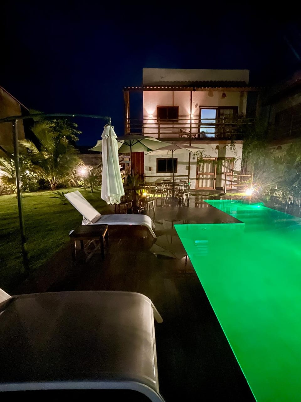 Property building, Night, Natural landscape, Pool view, Swimming pool, sunbed