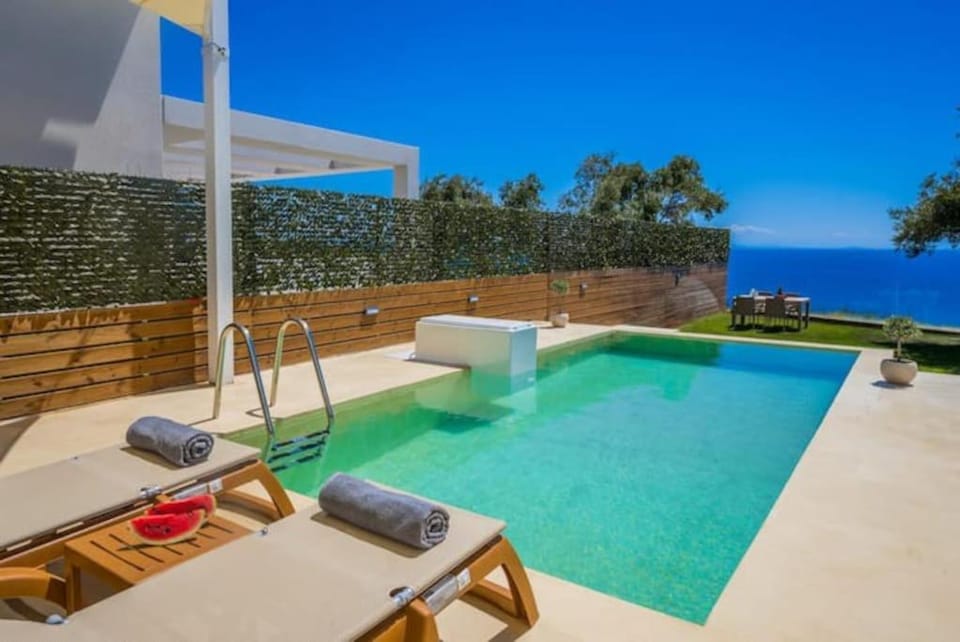 Patio, Day, Natural landscape, Pool view, Sea view, Swimming pool, towels