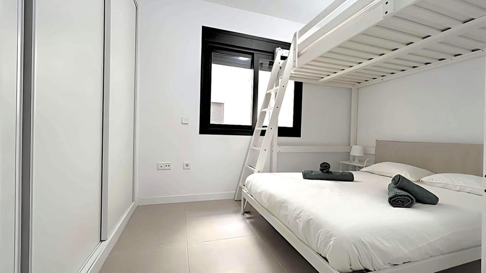 Bed, Photo of the whole room, Bedroom, bunk bed, towels, wardrobe
