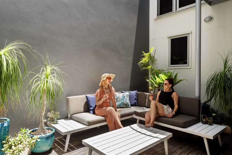 Patio, Living room, Seating area, group of guests