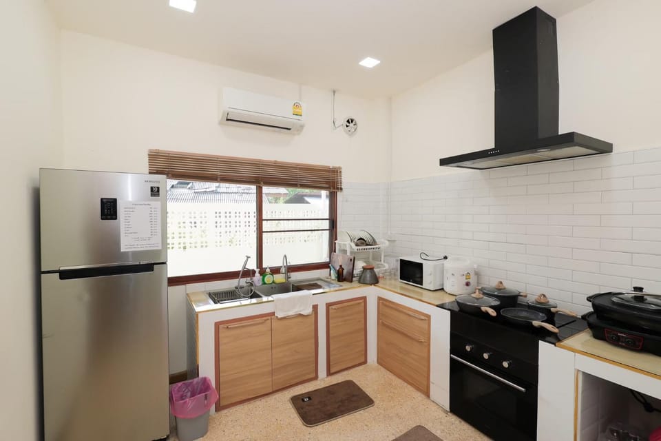 Kitchen or kitchenette, oven, stove, air conditioner